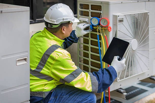 Professional Air Duct Cleaning technician working in Mequon, WI